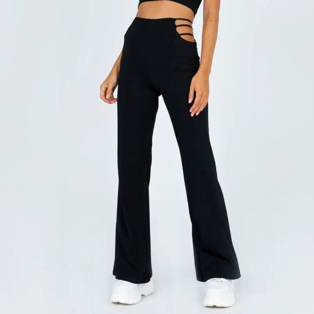 Princess Polly Black Ariarne Flare Pants Cut Out High Waist Size 4 Women’s - Picture 1 of 6